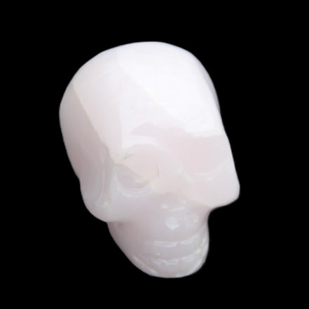 Mangano Calcite skull 30*42*35mm 83g in sunlight - Rocks and Things Store