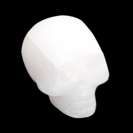 Mangano Calcite skull 30*42*35mm 83g in sunlight - Rocks and Things Store