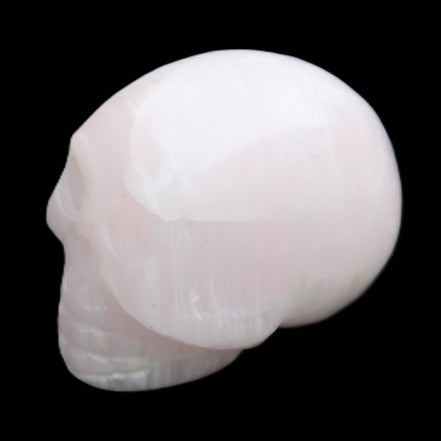 Mangano Calcite skull 30*42*35mm 83g in sunlight - Rocks and Things Store