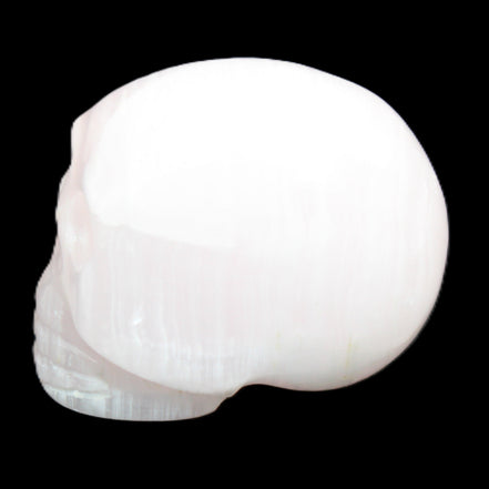 Mangano Calcite skull 30*42*35mm 83g in sunlight - Rocks and Things Store