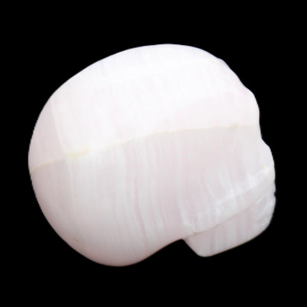 Mangano Calcite skull 30*42*35mm 83g in sunlight - Rocks and Things Store