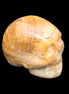 BumbleBee Banded Calcite skull 32*46*39mm 106g in sunlight - Rocks and Things Store