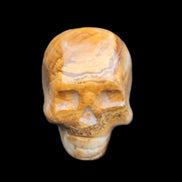 BumbleBee Banded Calcite skull 32*46*39mm 106g in sunlight - Rocks and Things Store