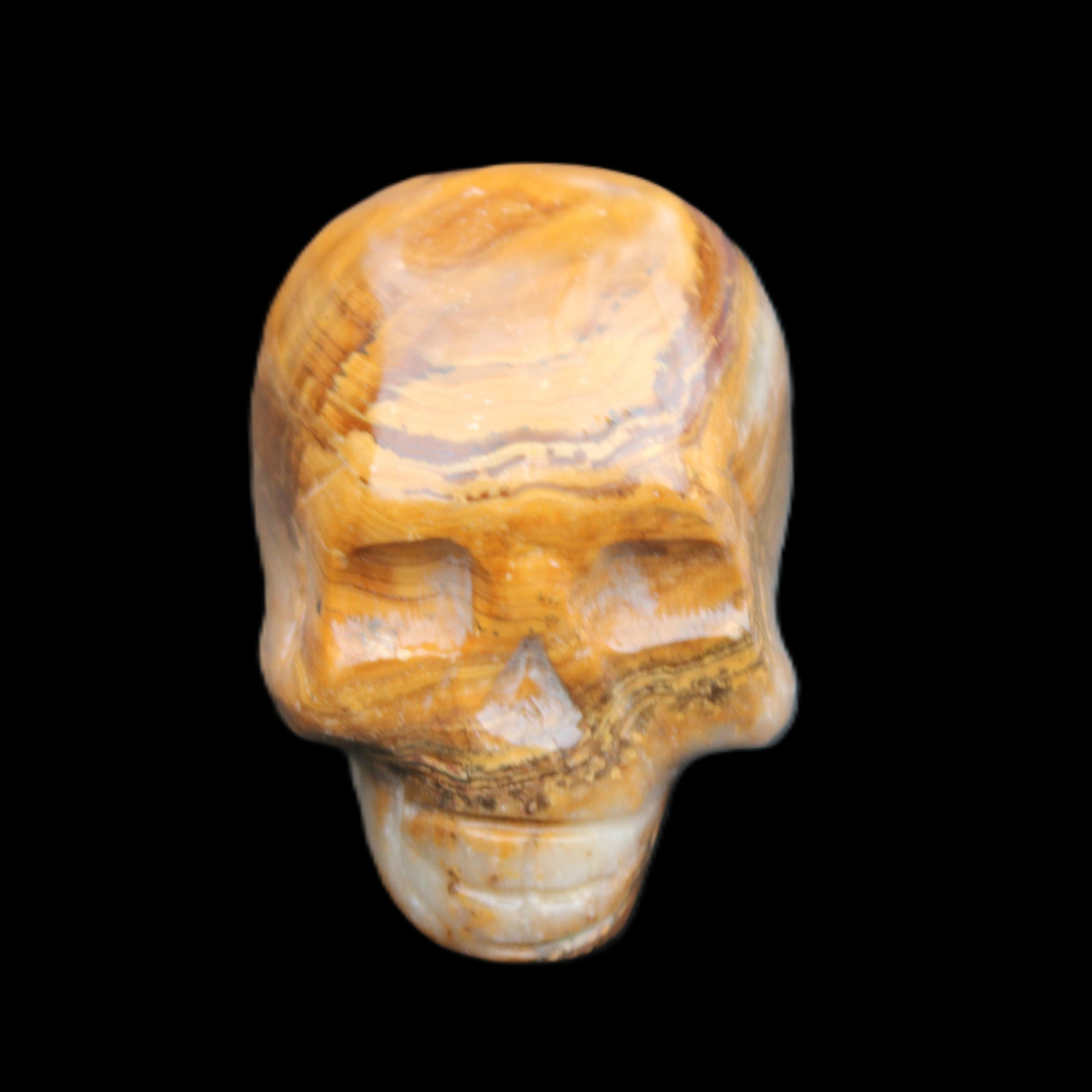 BumbleBee Banded Calcite skull 32*46*39mm 106g in sunlight - Rocks and Things Store