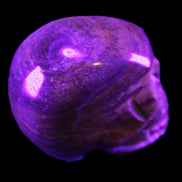 BumbleBee Banded Calcite skull 35*47*39mm 112g in UV light - Rocks and Things Store