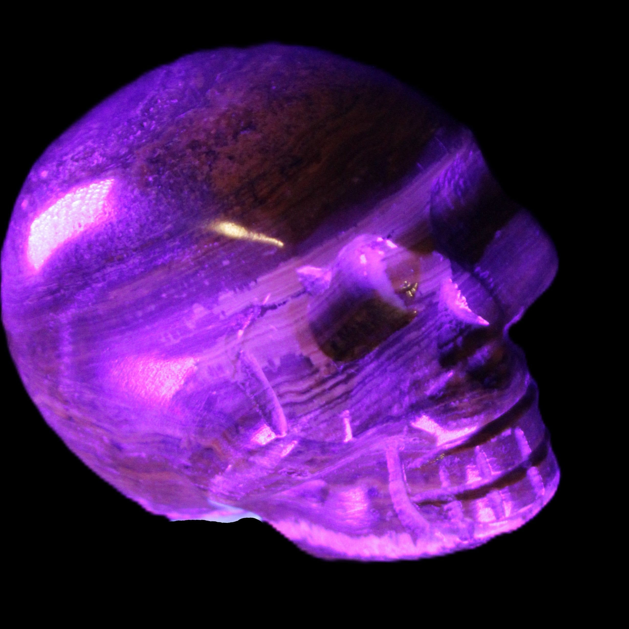 BumbleBee Banded Calcite skull 35*47*39mm 112g in UV light - Rocks and Things Store