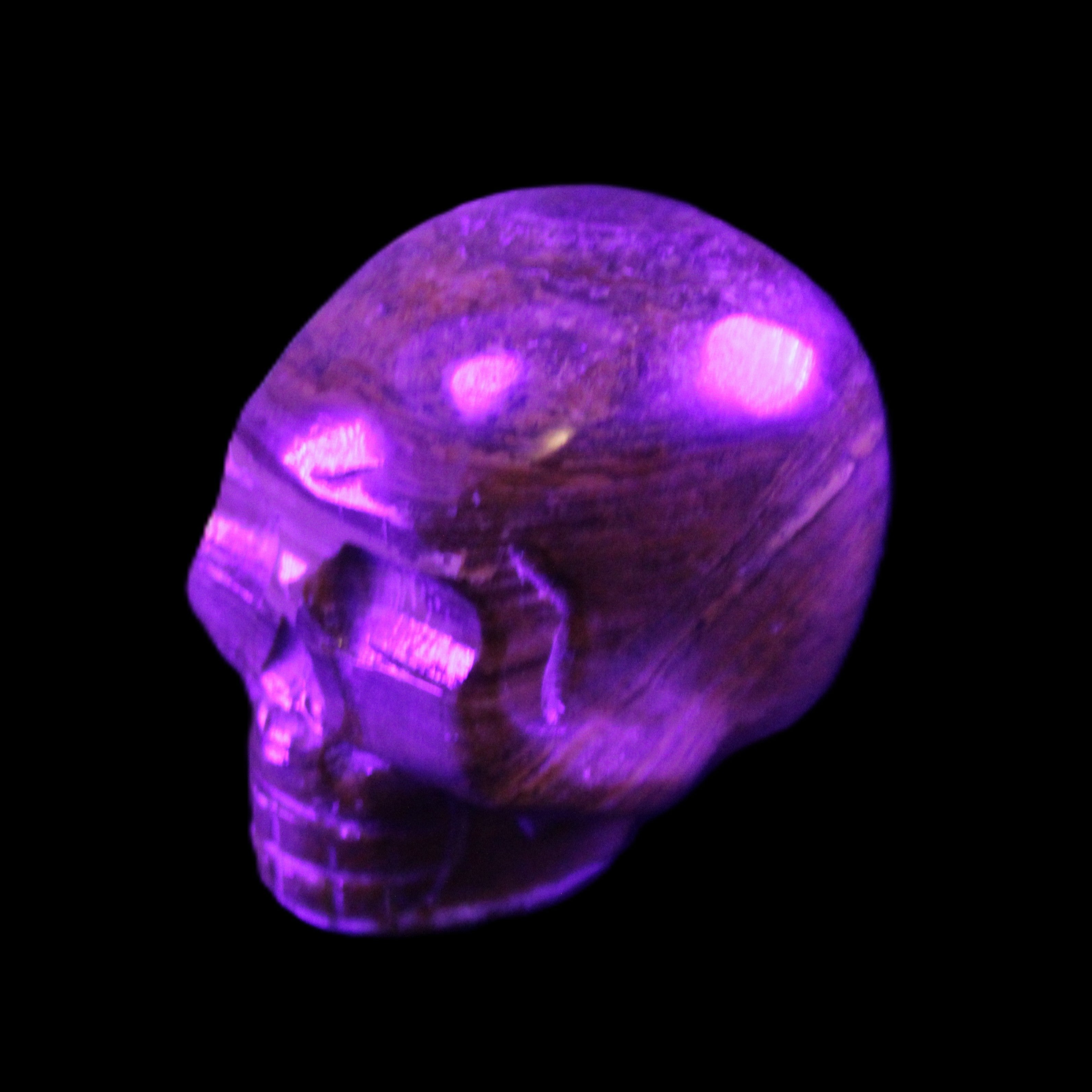 BumbleBee Banded Calcite skull 35*47*39mm 112g in UV light - Rocks and Things Store