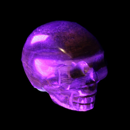 BumbleBee Banded Calcite skull 35*47*39mm 112g in UV light - Rocks and Things Store