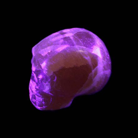 Honey Calcite skull from Pakistan 28*44*36mm 93g in UV light - Rocks and Things Store