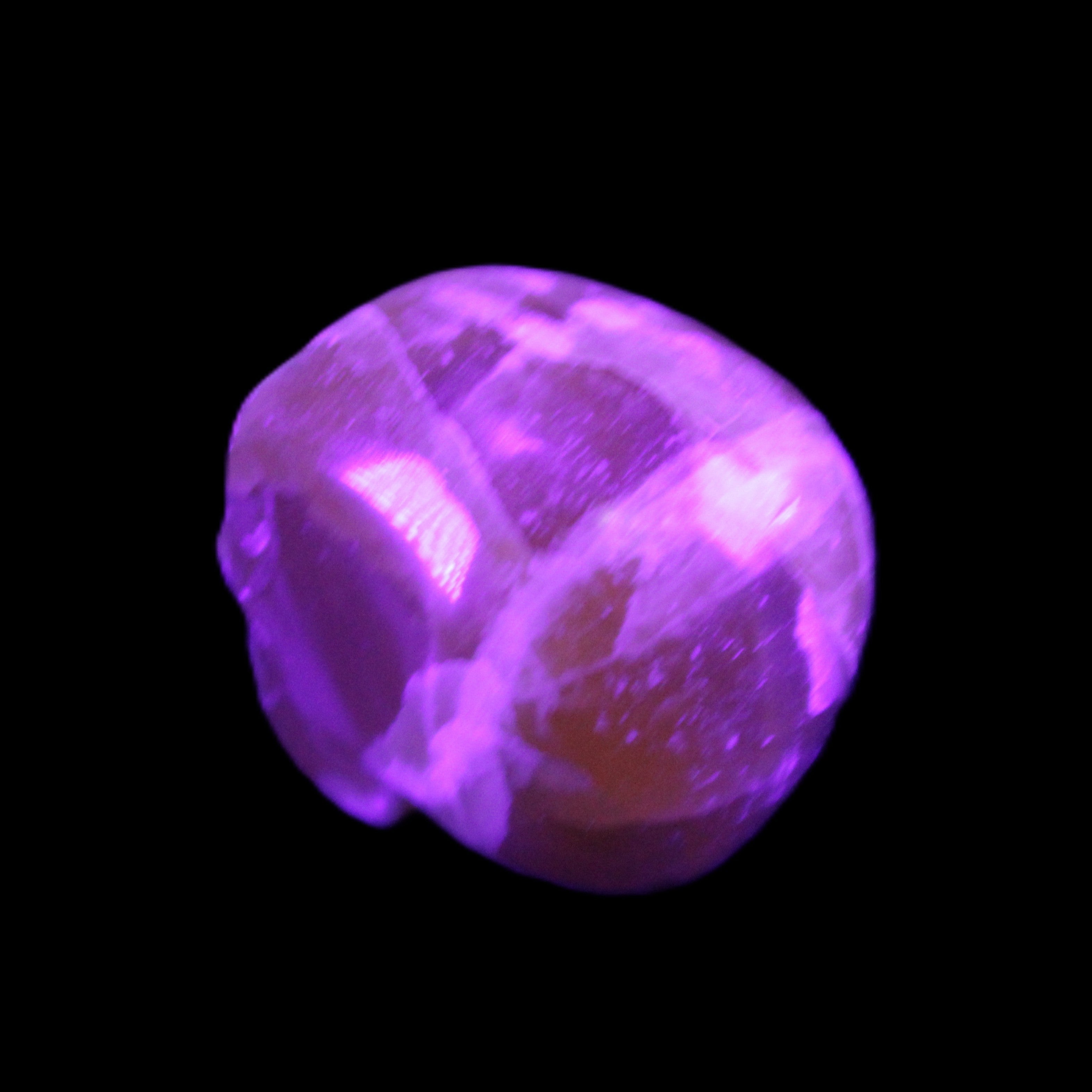 Honey Calcite skull from Pakistan 28*44*36mm 93g in UV light - Rocks and Things Store