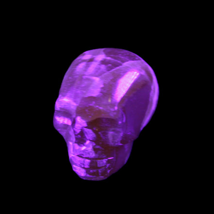 Honey Calcite skull from Pakistan 28*44*36mm 93g in UV light - Rocks and Things Store