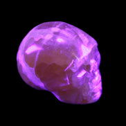 Honey Calcite skull from Pakistan 28*44*36mm 93g in UV light - Rocks and Things Store