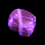 Honey Calcite skull from Pakistan 28*44*36mm 93g in UV light - Rocks and Things Store
