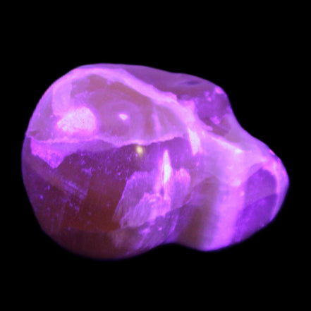 Honey Calcite skull from Pakistan 28*44*36mm 93g in UV light - Rocks and Things Store