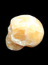 Honeycomb Calcite skull from Pakistan 28*38*34mm 62g in sunlight - Rocks and Things Store