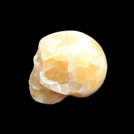 Honeycomb Calcite skull from Pakistan 28*38*34mm 62g in sunlight - Rocks and Things Store