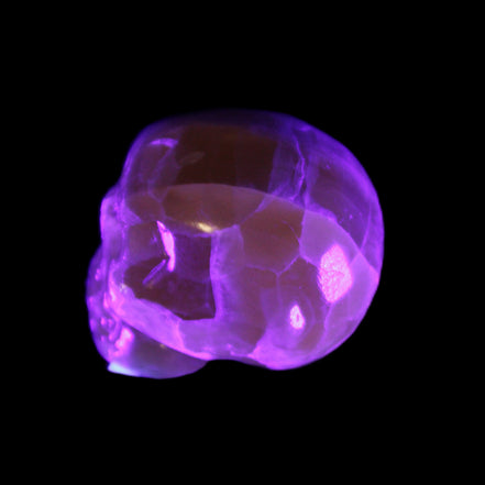 Honeycomb Calcite skull from Pakistan 28*38*34mm 62g in UV light - Rocks and Things Store