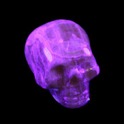 Honeycomb Calcite skull from Pakistan 28*38*34mm 62g in UV light - Rocks and Things Store