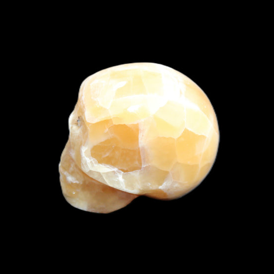 Honeycomb Calcite skull from Pakistan 28*38*34mm 62g in sunlight - Rocks and Things Store