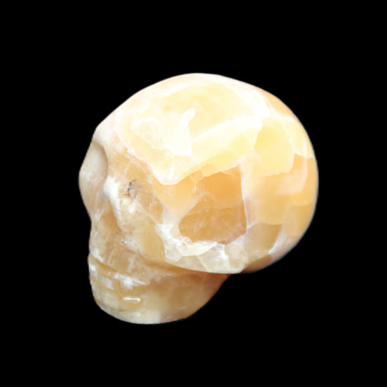 Honeycomb Calcite skull from Pakistan 28*38*34mm 62g in sunlight - Rocks and Things Store