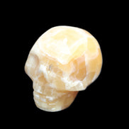 Honeycomb Calcite skull from Pakistan 28*38*34mm 62g in sunlight - Rocks and Things Store