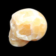 Honeycomb Calcite skull from Pakistan 28*38*34mm 62g in sunlight - Rocks and Things Store