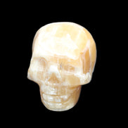Honeycomb Calcite skull from Pakistan 28*38*34mm 62g in sunlight - Rocks and Things Store