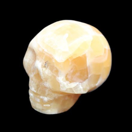 Honeycomb Calcite skull from Pakistan 28*38*34mm 62g in sunlight - Rocks and Things Store