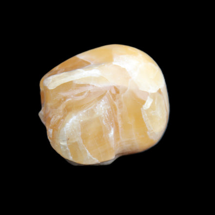 Honeycomb Calcite skull from Pakistan 28*38*34mm 62g in sunlight - Rocks and Things Store