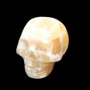 Honeycomb Calcite skull from Pakistan 28*38*34mm 62g in sunlight - Rocks and Things Store