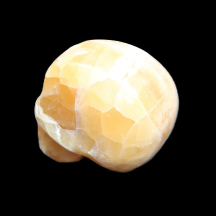 Honeycomb Calcite skull from Pakistan 28*38*34mm 62g in sunlight - Rocks and Things Store