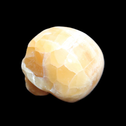 Honeycomb Calcite skull from Pakistan 28*38*34mm 62g in sunlight - Rocks and Things Store