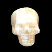 Honeycomb Calcite skull from Pakistan 28*38*34mm 62g in sunlight - Rocks and Things Store