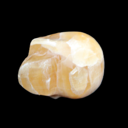 Honeycomb Calcite skull from Pakistan 28*38*34mm 62g in sunlight - Rocks and Things Store