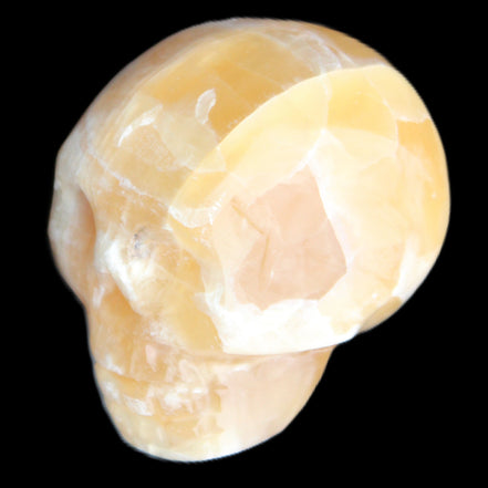 Honeycomb Calcite skull from Pakistan 28*38*34mm 62g in sunlight - Rocks and Things Store