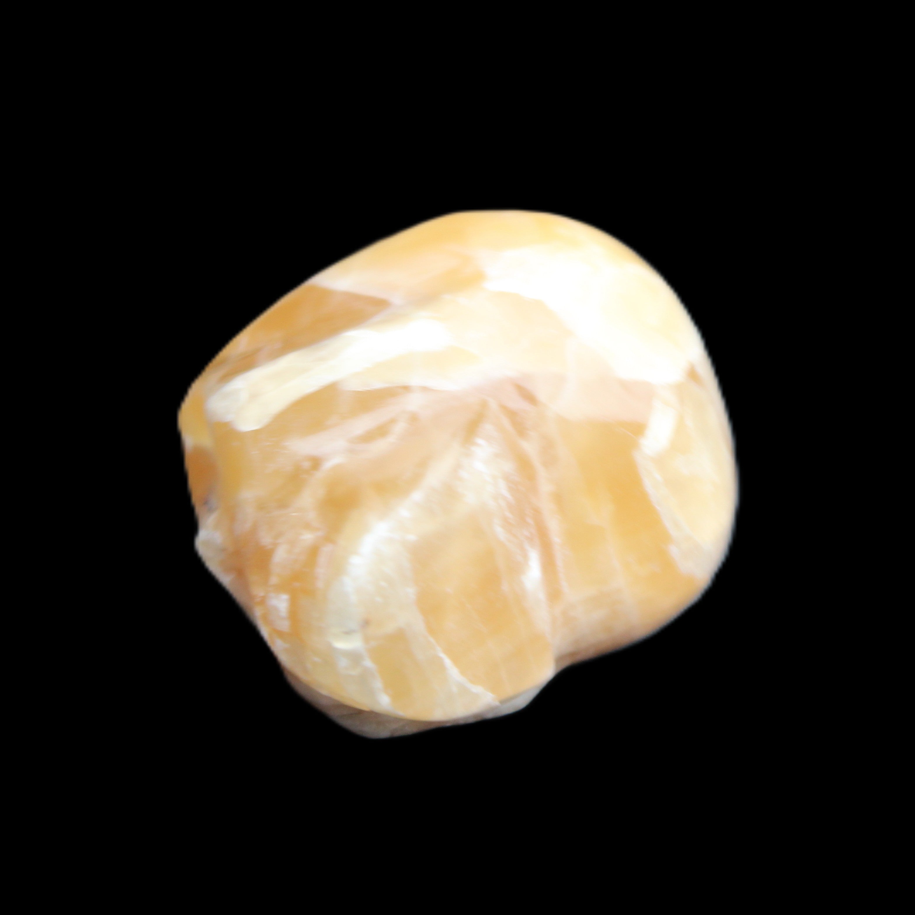 Honeycomb Calcite skull from Pakistan 28*38*34mm 62g in sunlight - Rocks and Things Store