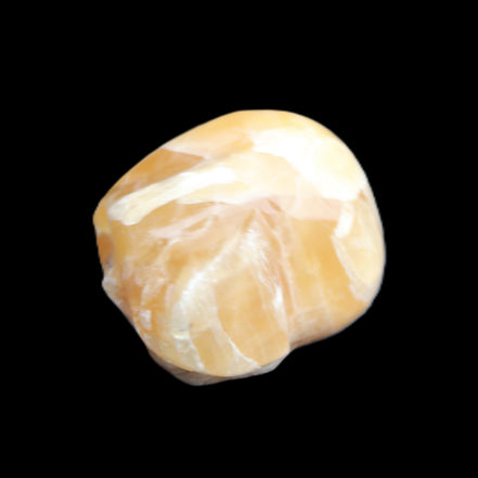 Honeycomb Calcite skull from Pakistan 28*38*34mm 62g in sunlight - Rocks and Things Store
