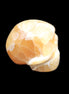 Honey Calcite skull from Pakistan 30*40*35mm 80g in sunlight - Rocks and Things Store