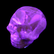 Honey Calcite skull from Pakistan 30*40*35mm 80g in UV light - Rocks and Things Store