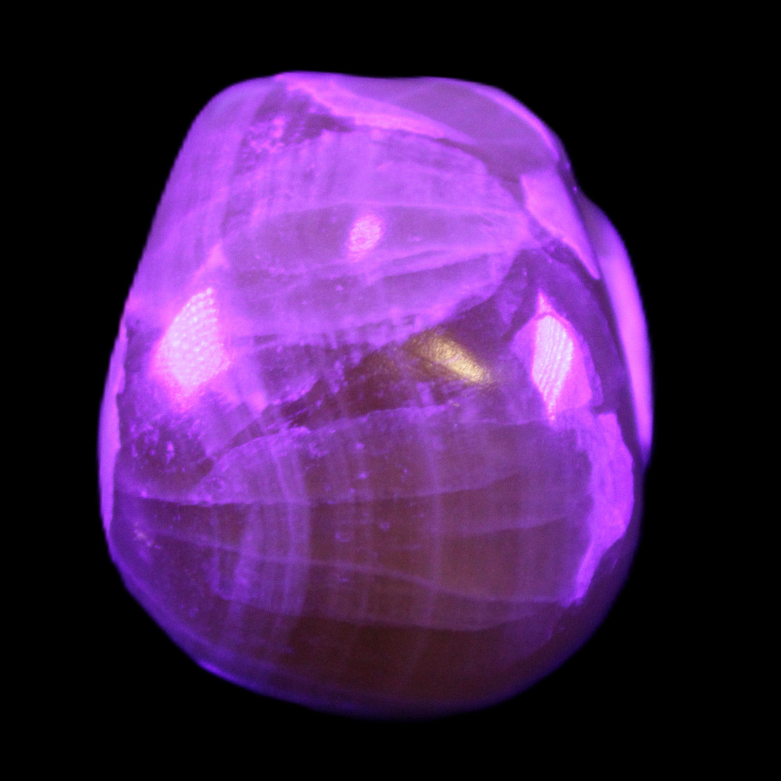 Honey Calcite skull from Pakistan 30*40*35mm 80g in UV light - Rocks and Things Store