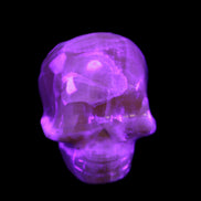 Honey Calcite skull from Pakistan 30*40*35mm 80g in UV light - Rocks and Things Store