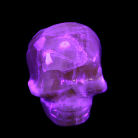 Honey Calcite skull from Pakistan 30*40*35mm 80g in UV light - Rocks and Things Store