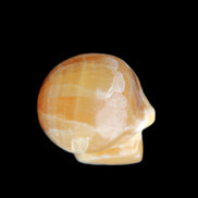 Honey Calcite skull from Pakistan 30*40*35mm 80g in sunlight - Rocks and Things Store