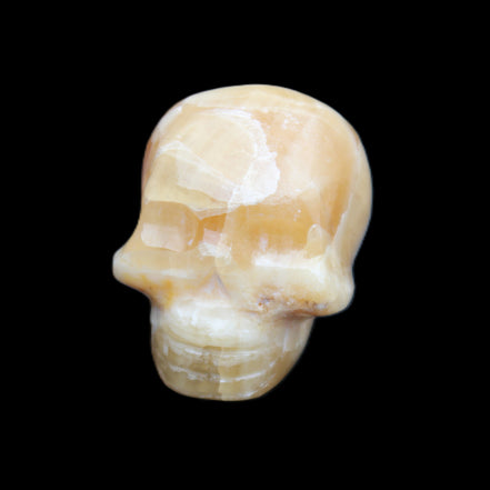Honey Calcite skull from Pakistan 30*40*35mm 80g in sunlight - Rocks and Things Store