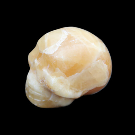 Honey Calcite skull from Pakistan 30*40*35mm 80g in sunlight - Rocks and Things Store