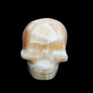 Honey Calcite skull from Pakistan 30*40*35mm 80g in sunlight - Rocks and Things Store