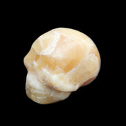 Honey Calcite skull from Pakistan 30*40*35mm 80g in sunlight - Rocks and Things Store