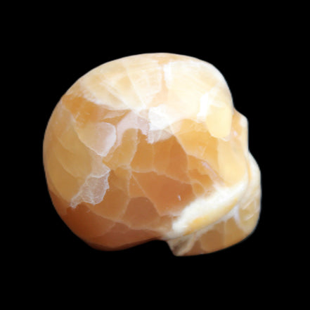 Honey Calcite skull from Pakistan 30*40*35mm 80g in sunlight - Rocks and Things Store