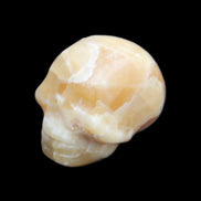 Honey Calcite skull from Pakistan 30*40*35mm 80g in sunlight - Rocks and Things Store