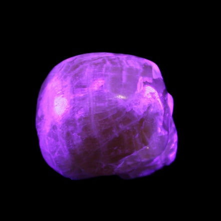 Honey Calcite skull from Pakistan 25*34*33mm 67g in UV light - Rocks and Things Store